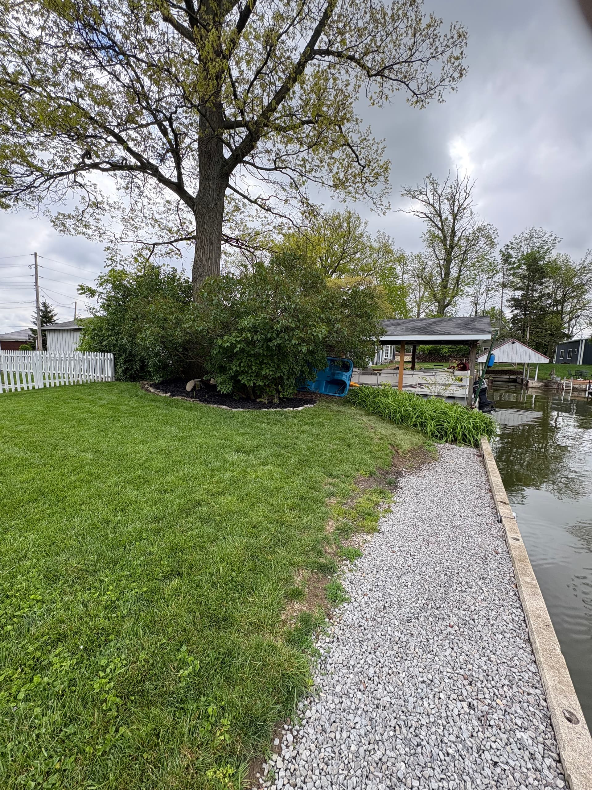 Gallery photos for Lake Property Bed Cleanup Mulch and River Rock Done Right: Image #8